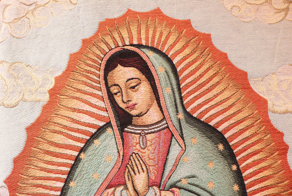 A tapestry of Our Lady Of Guadalupe on the wall of an education room at Sacred Heart Catholic Church in Springfield MO